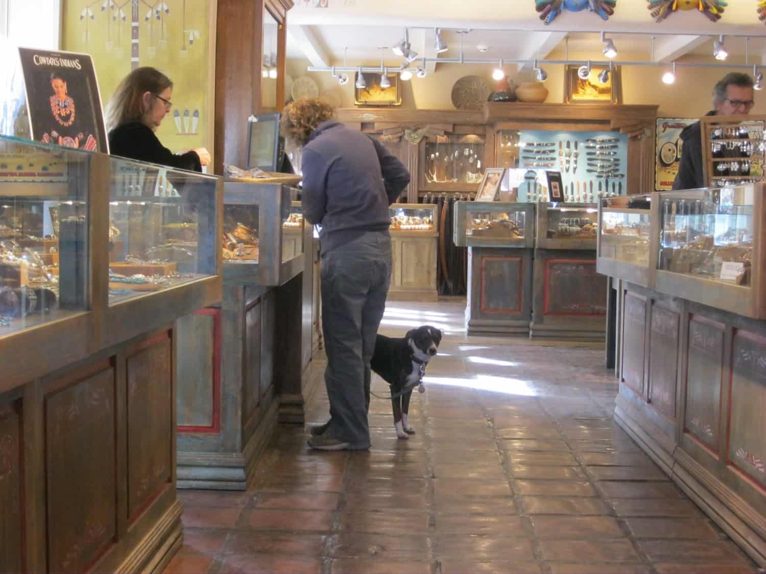 Dog and person shopping in Santa Fe, NM