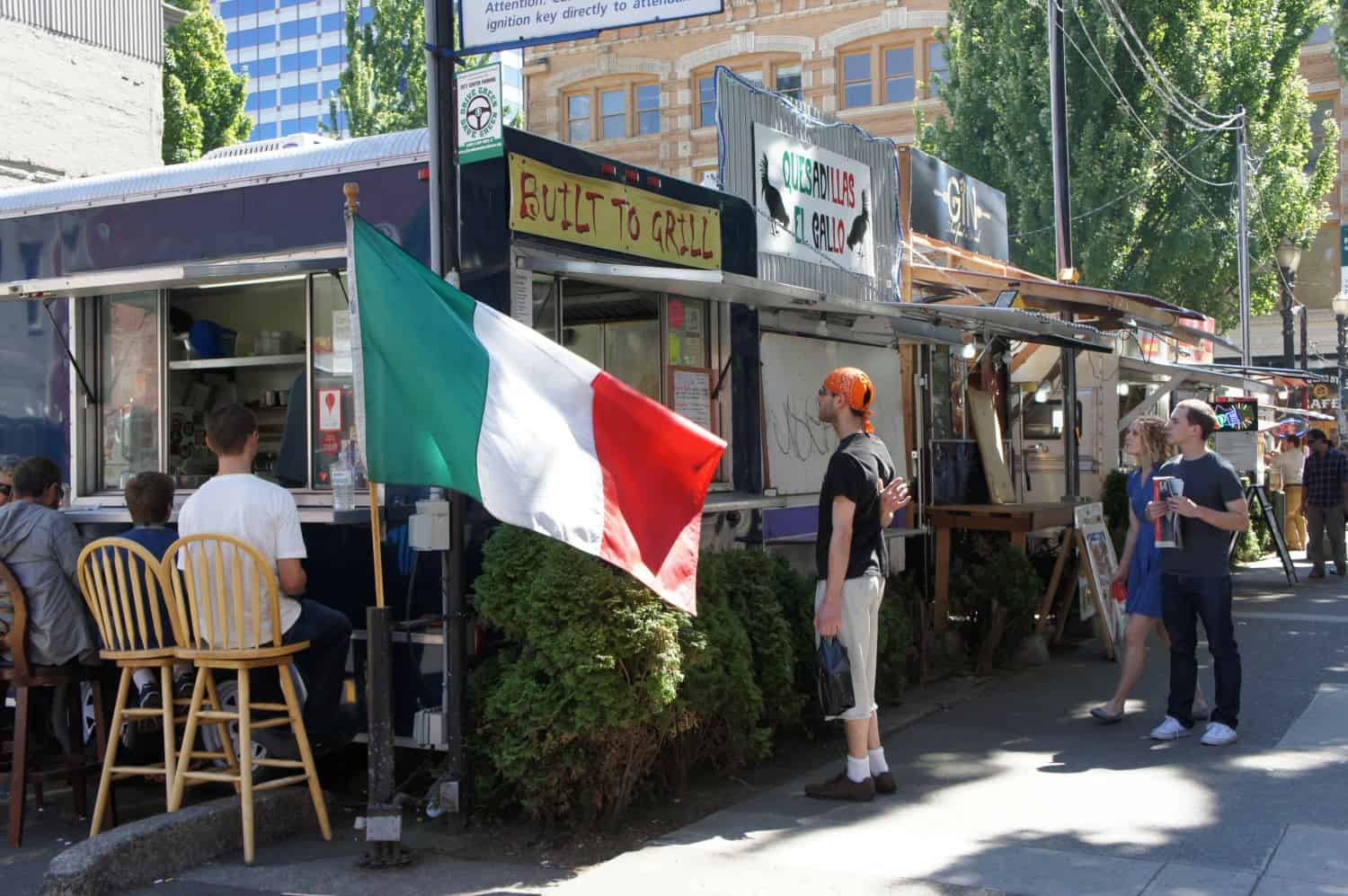 Man standing in front of one of Portland's many food trucks