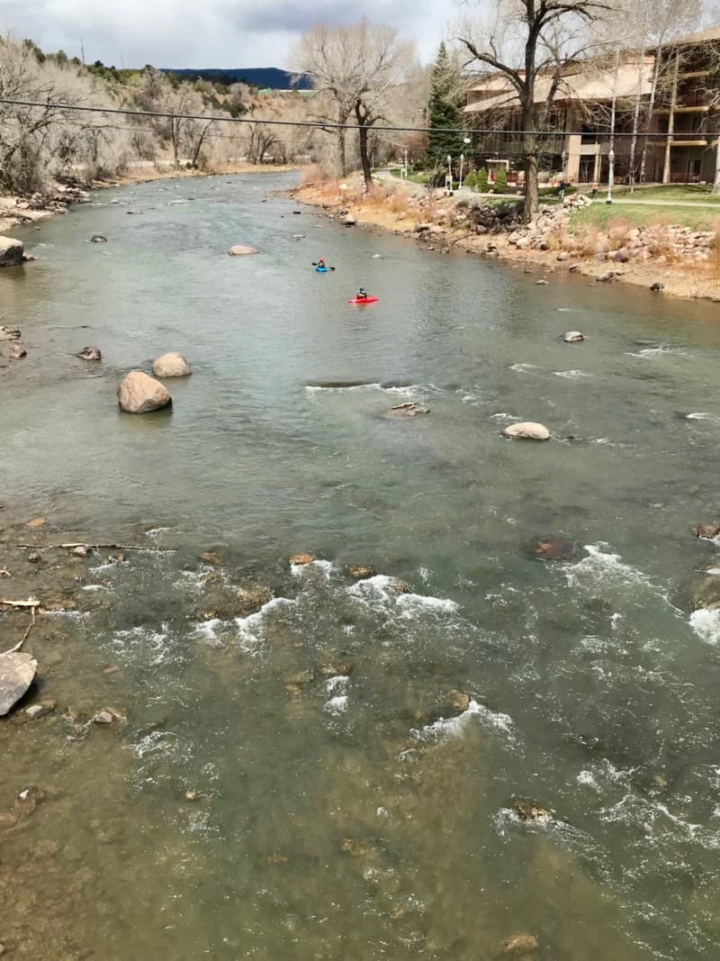 Kayaks on the Animas River in Durango, CO