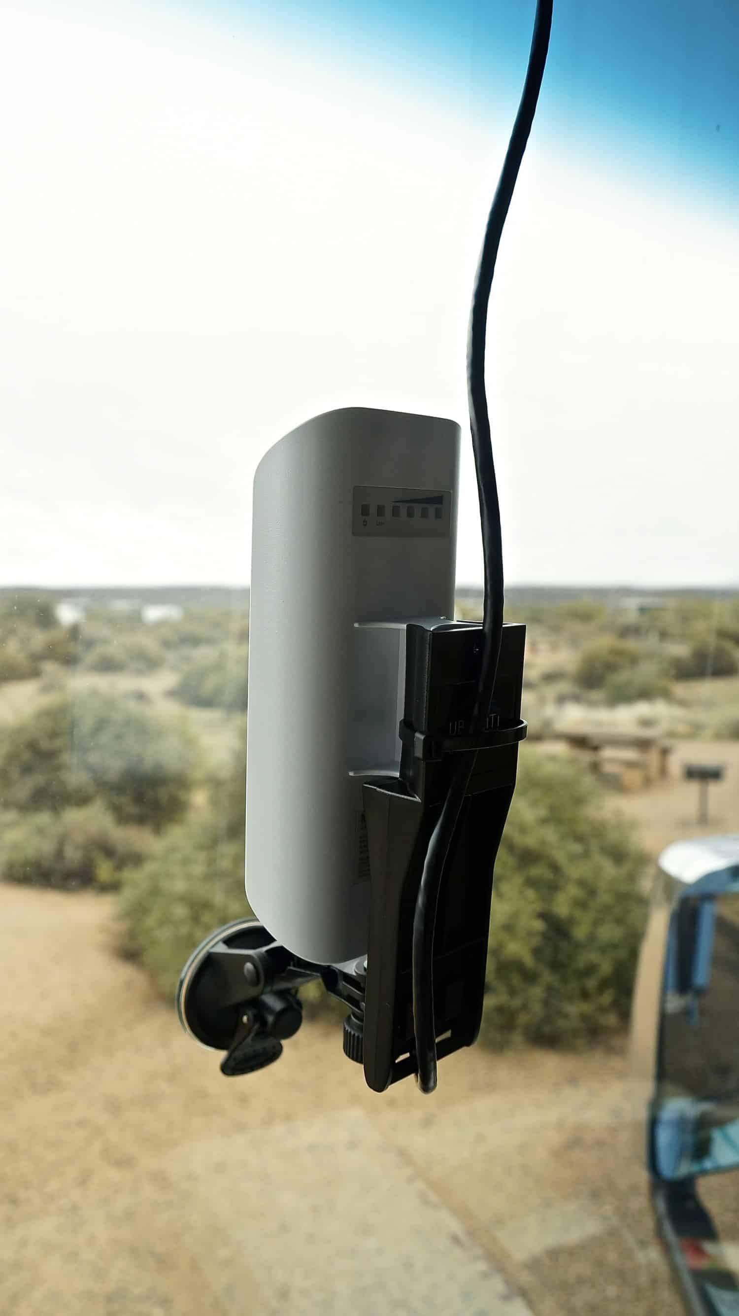 UBiQUiTi NanoStation WiFi Antenna in the windshield of the GoPetFriendly.com Winnebago