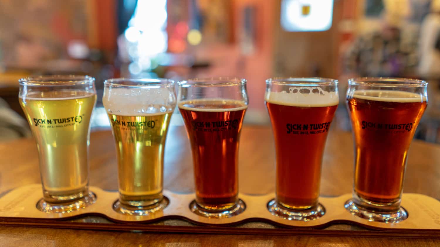 A flight of beers from pet-friendly Sick-N-Twisted Brewing in Hill City, SD