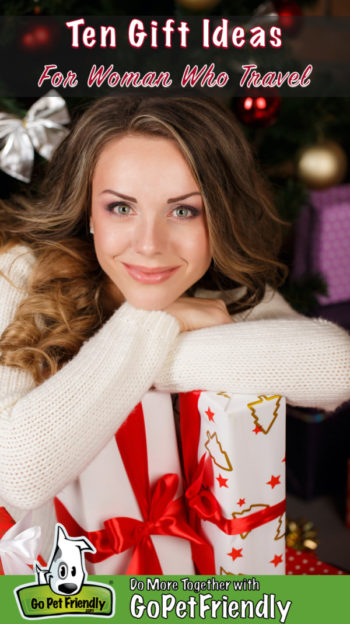 Woman in a Christmas scene holding a gift
