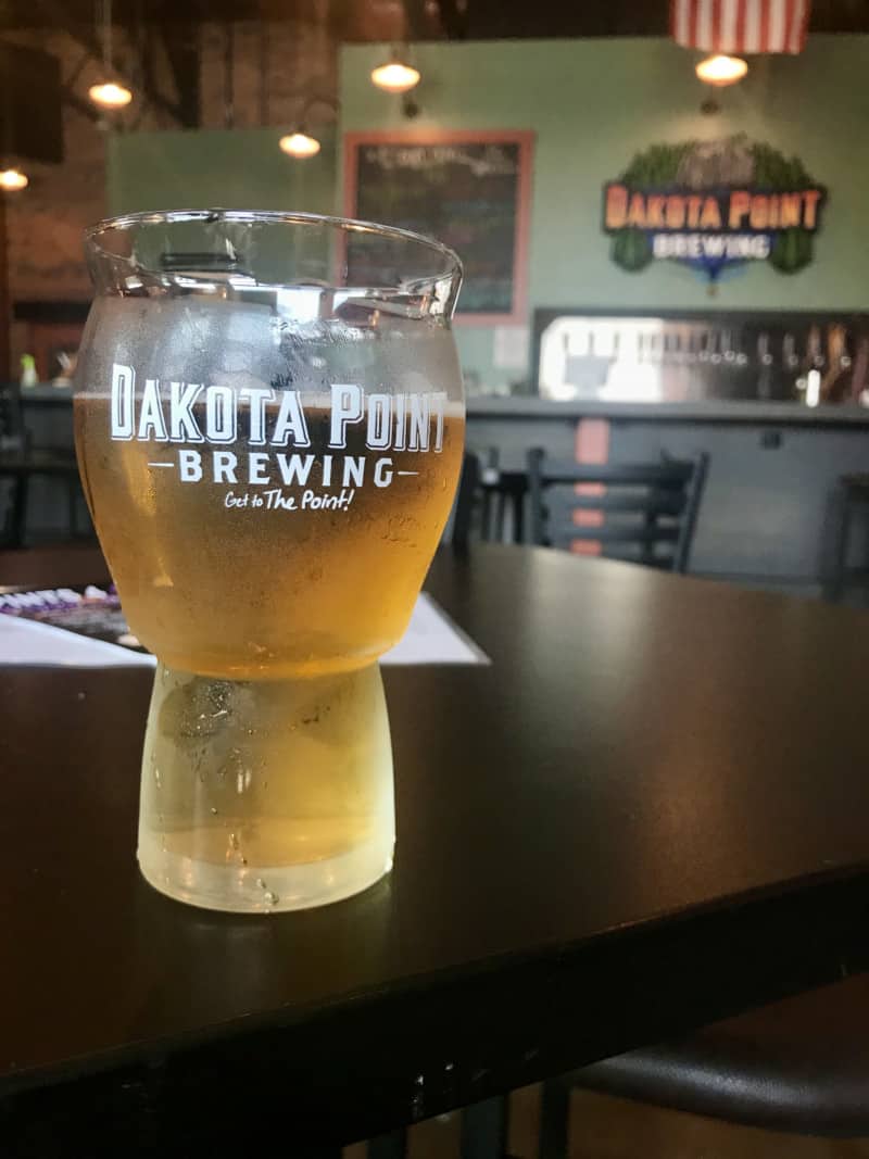 Beer glass on a table at pet friendly Dakota Point Brewing in Rapid City, SD