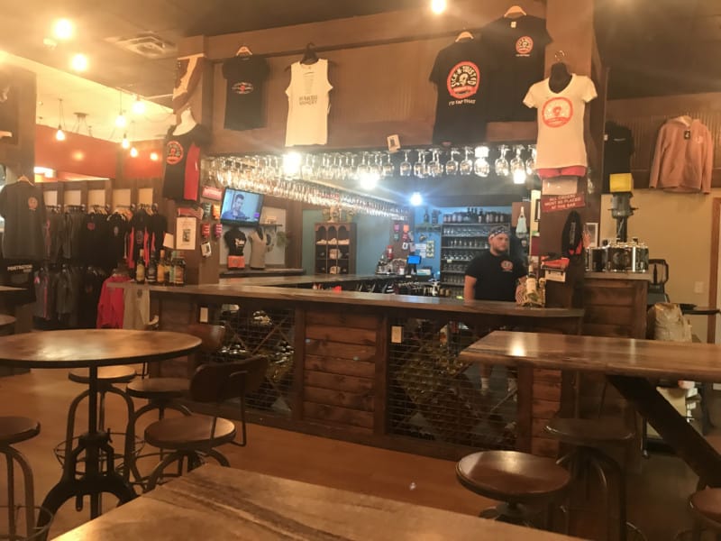 The bar at pet friendly Naked Winery Tasting Room & Sick-N-Twisted Brew Pub in Deadwood, SD