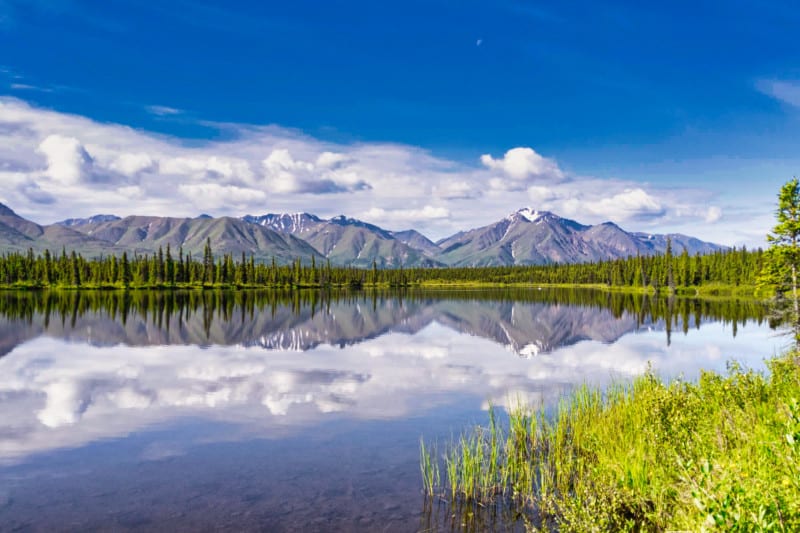Lake with mountains in the background in Wrangell-St. Elias National Park and Preserve in Alaska