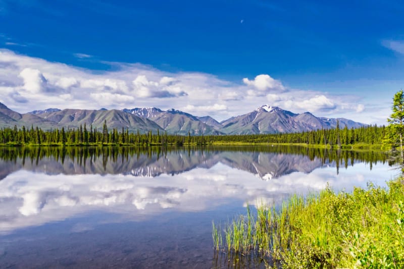 Lake with mountains in the background in Wrangell-St. Elias National Park and Preserve in Alaska