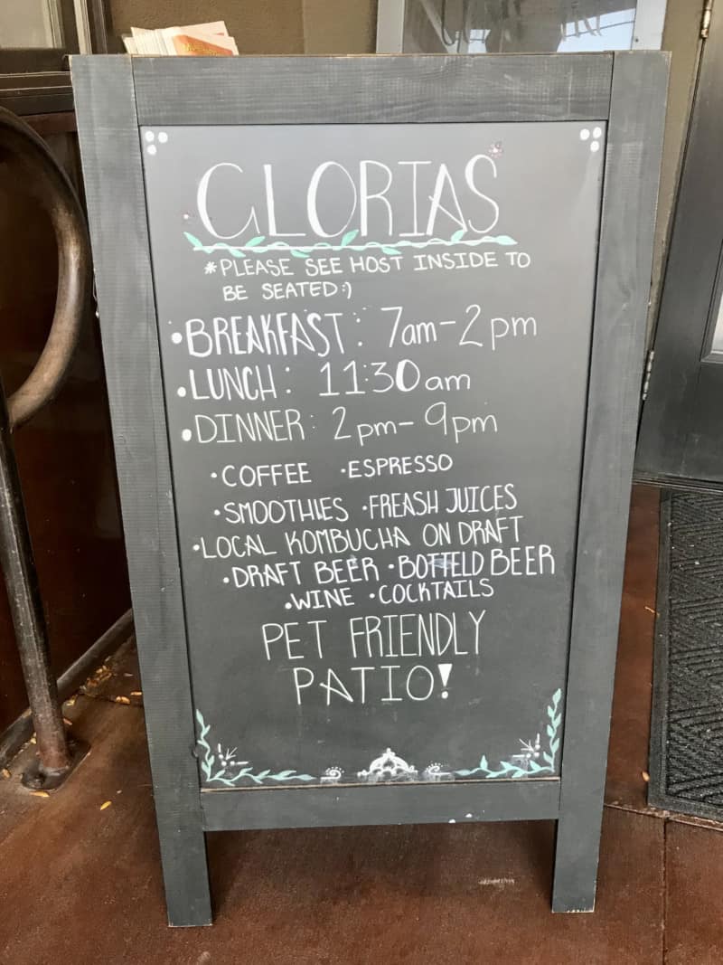 Sandwich sign for pet friendly Gloria's Café in Moab, UT
