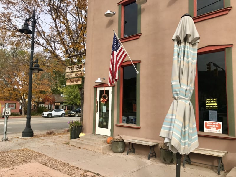 Outdoor seating area at dog friendly Trailhead Public House and Eatery in Moab, UT