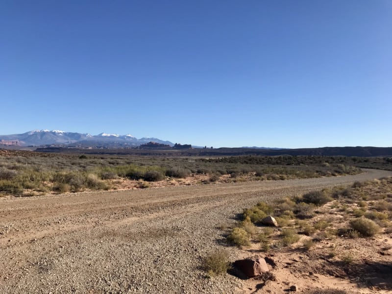 View of La Sal Mountains from Salt Valley Road in Arches National Park - Moab, UT