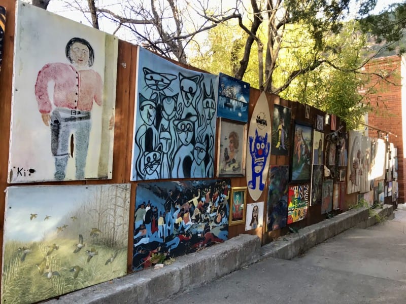 Paintings attached to a fence in Bisbee, AZ
