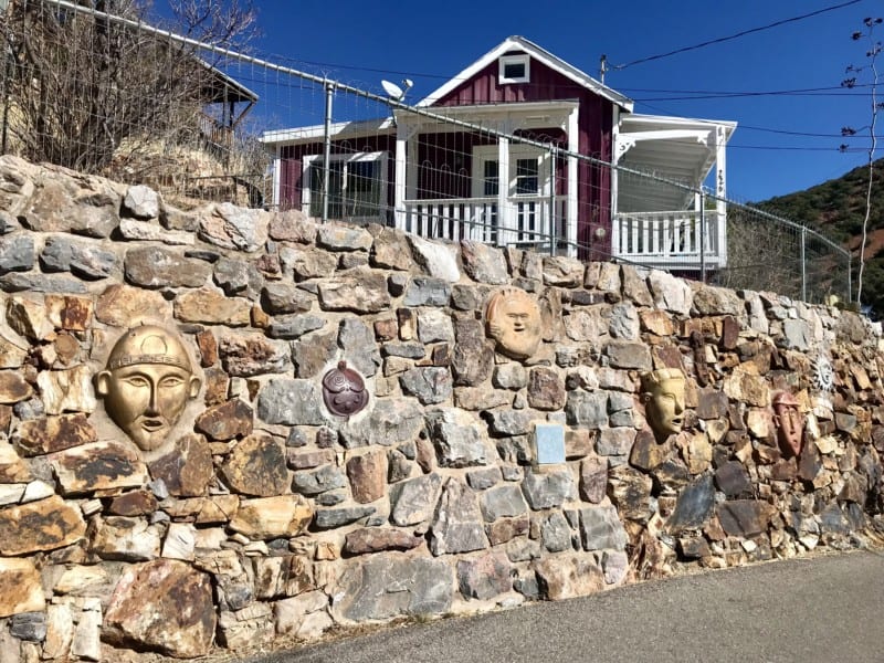 Art built into a retaining wall in Bisbee, AZ