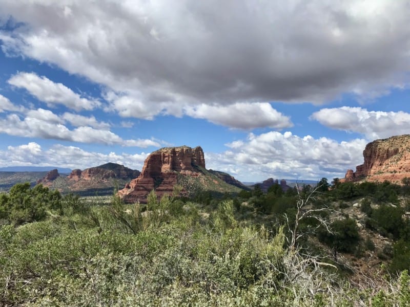 View of red rock formations from Rabbit Ears Trail in Sedona, AZ