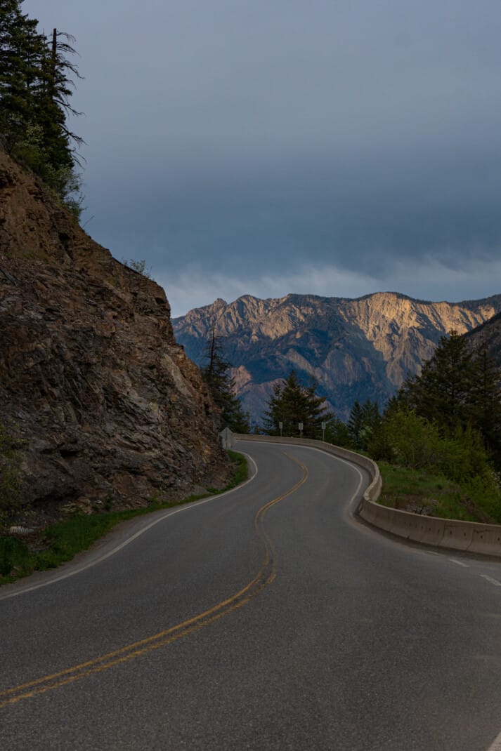 Empty winding highway through desert mountains in Lillooet, BC.