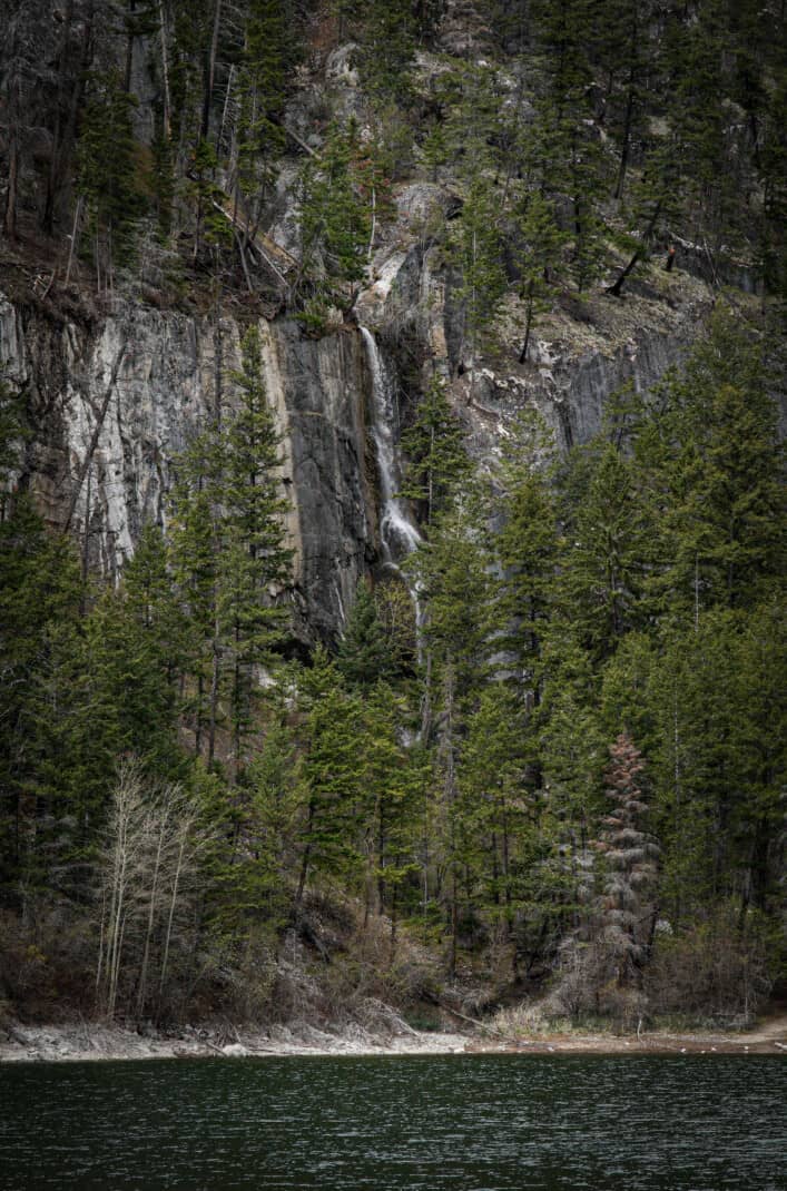 Waterfall coming down the cliffs in to the river.