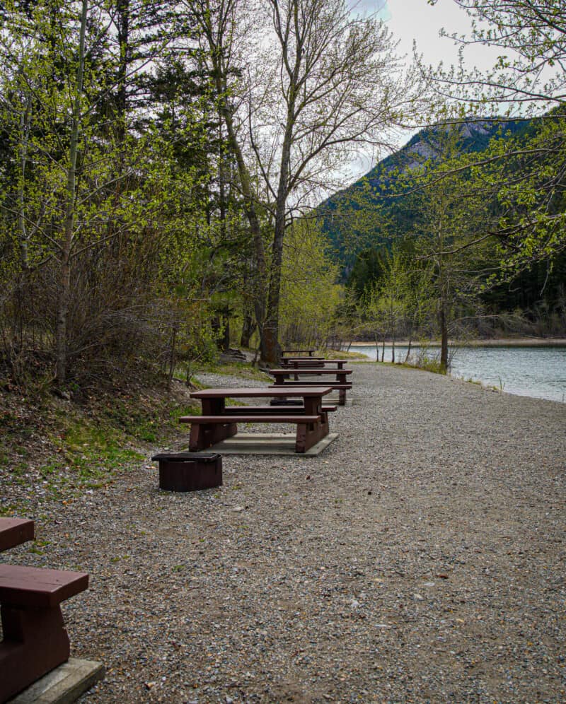 Lillooet to Kamloops road trip lunch stop. Picnic tables and fire rings along the river.