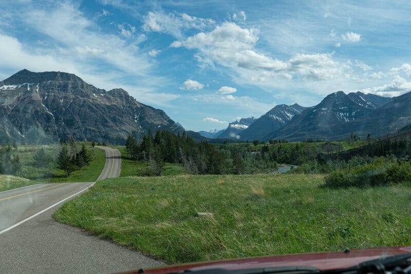 Prairie and mountain view along the red rock parkway in Waterton Lakes National Park.
