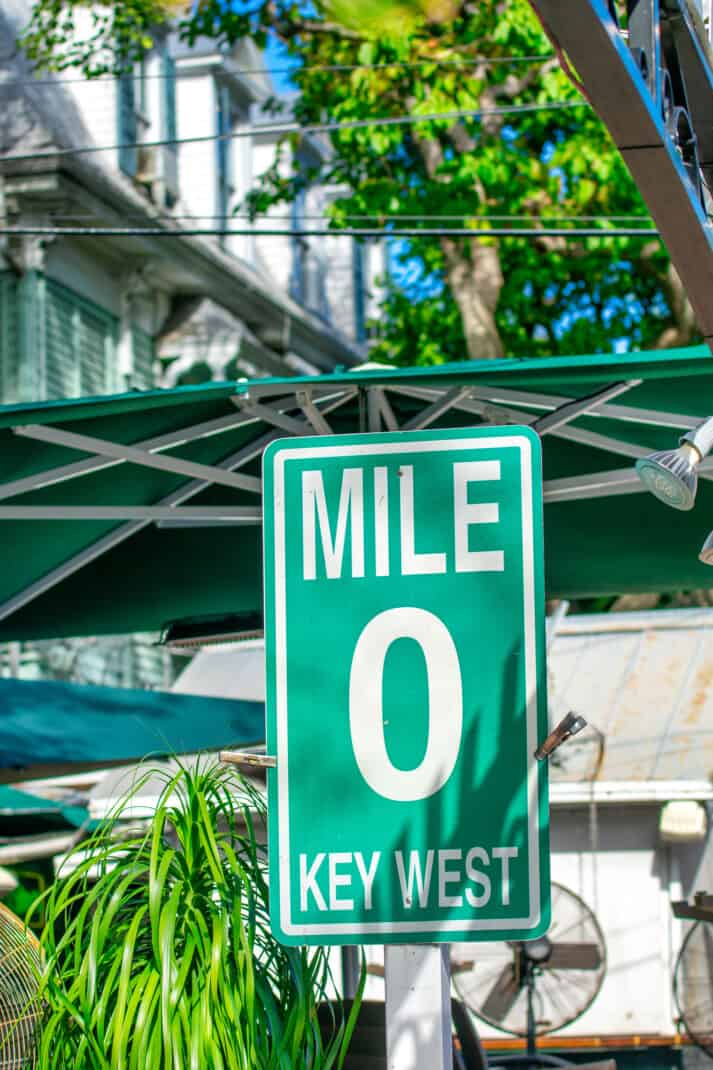 Famous Mile 0 street sign in pet friendly Key West, Florida.
